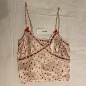 Super cute floral tank from urban outfitters. Never worn! NWT!! £34=41.93$